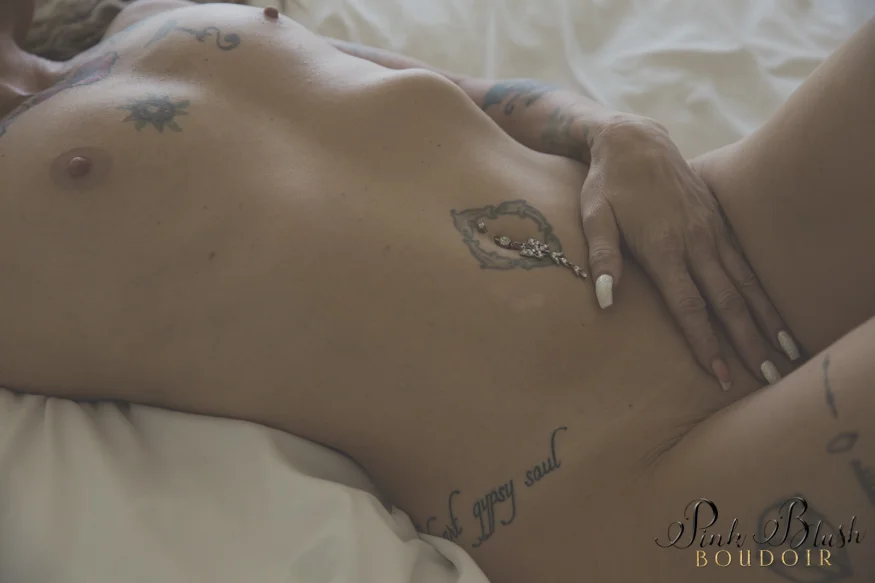 Edmonton Boudoir, a tattooed woman's naked body