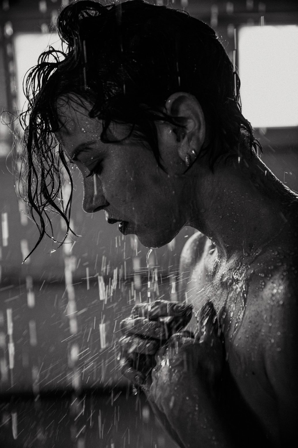 Capturing Elegance in the Rain Room Boudoir: A Fusion of Industrial Chic and Sensual Glamour