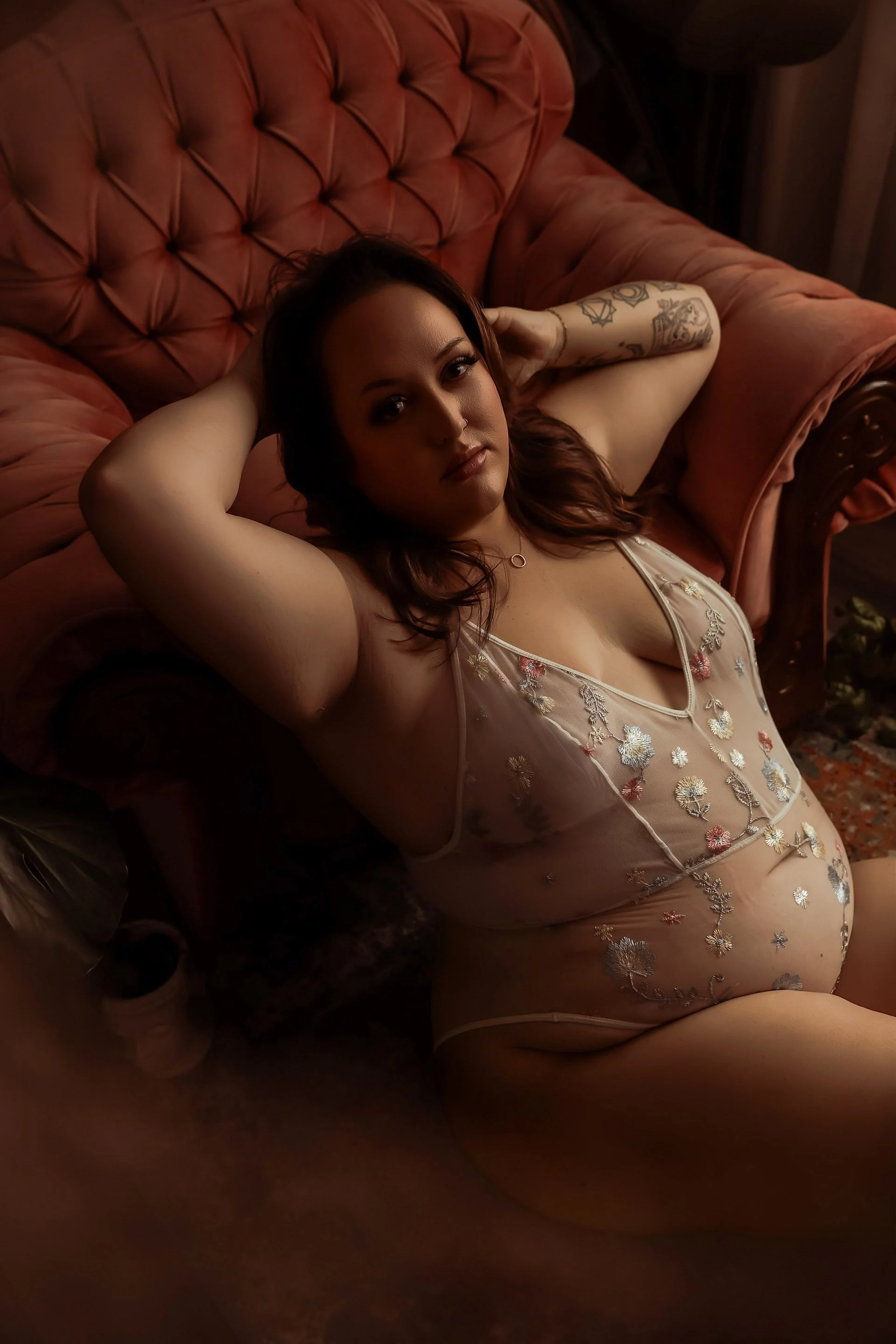 Curvy woman in sheer white lingerie, in pink boho inspired set, Boudoir Photography studio Edmonton Alberta