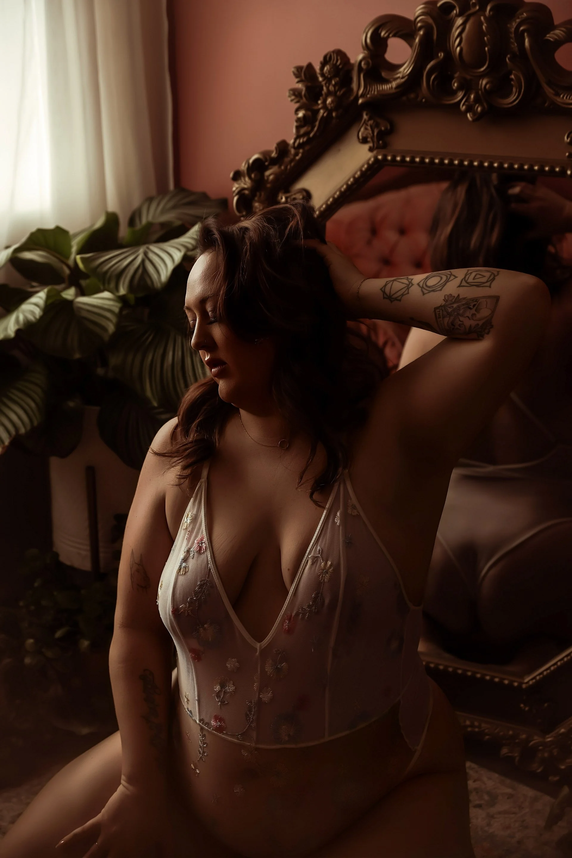 Curvy woman in sheer white lingerie, in pink boho inspired set, Boudoir Photography studio Edmonton Alberta