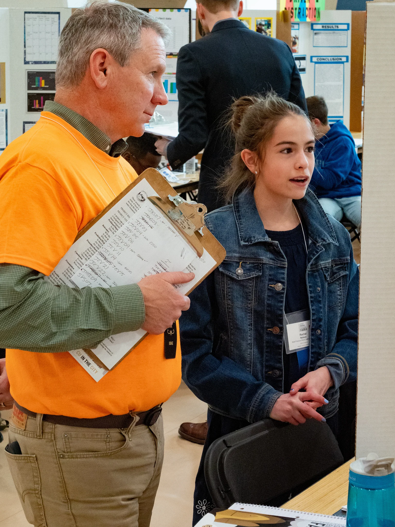 Donny connecting with a student over SCIENCE!