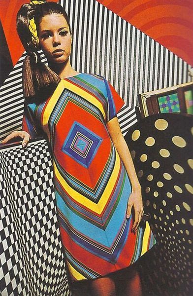 This show-stopping op art dress with vibrant colors is AMAZING. ( is )