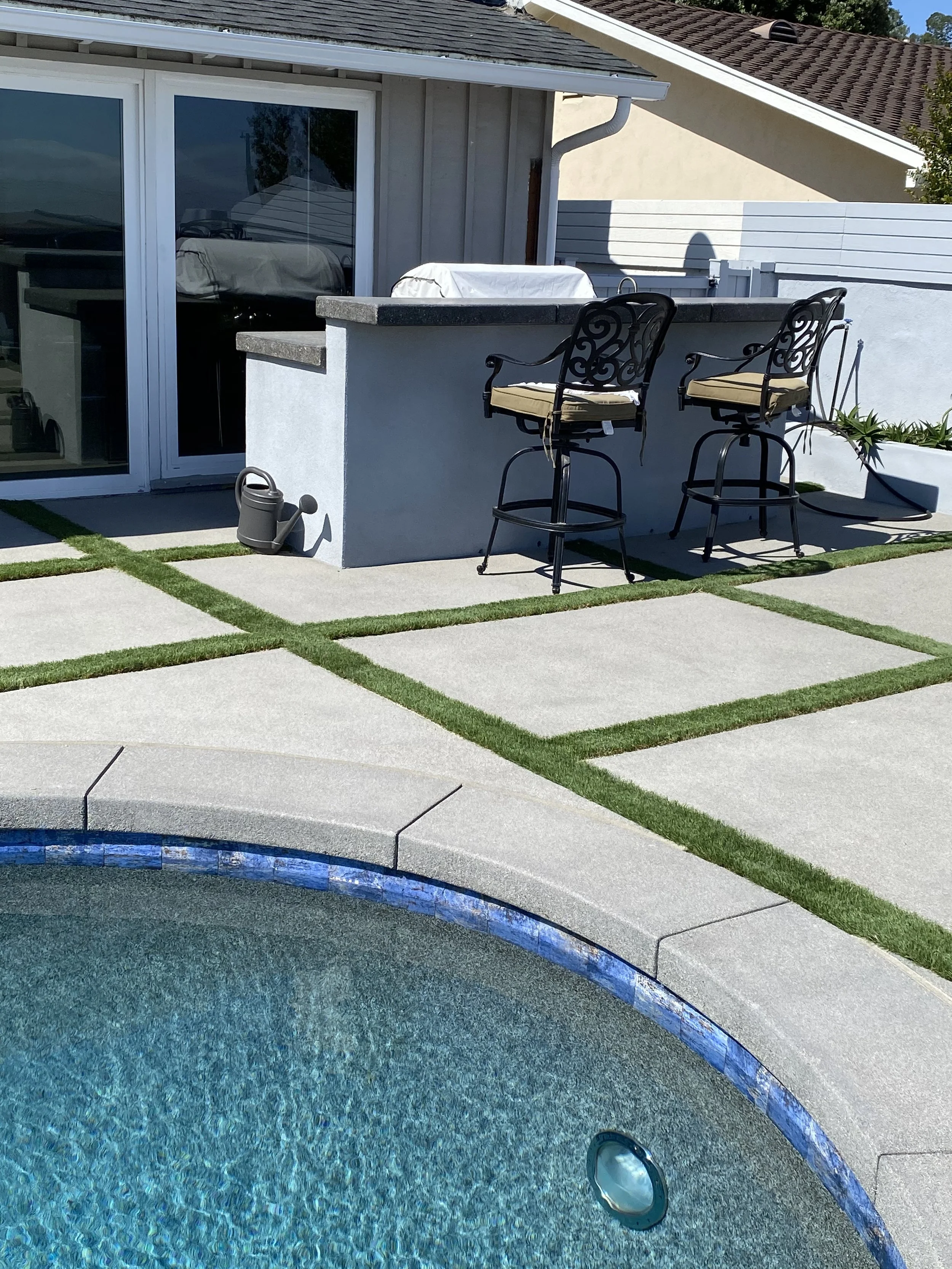 Sandwashed pool deck and coping