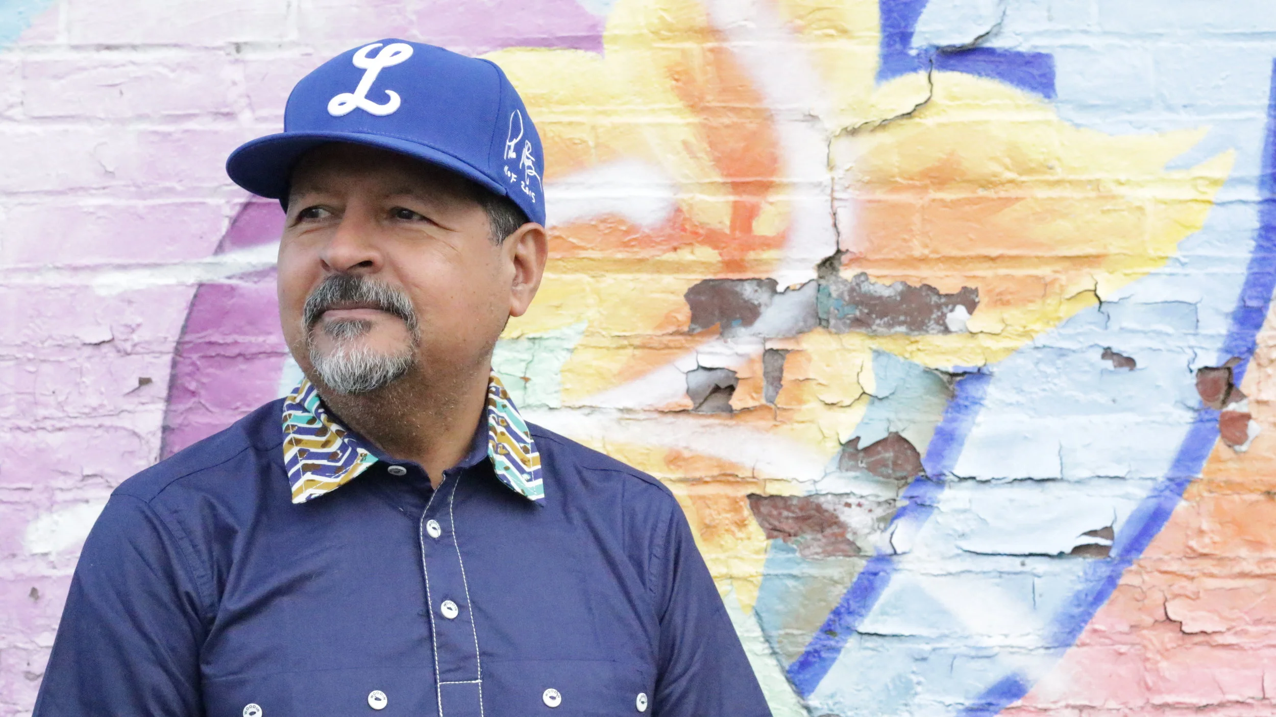 Leonidas Eduardo Valenzuela was born in Las Matas de Farfan, Dominican Republic in 1957. He is an agronomist who studied at el Instituto Agronómico Salesiano en La Vega, Dominican Republic. Aside from being an agronomist he is also a music aficionado - with a collection of music that spans from Mozart to Juan Luis Guerra to BB King to Thelonious Monk. In the 70s Leonidas began studying guitar and enjoys playing now as a hobby (he says he likes it a lot and doesn’t play as often as he should). While in college he performed in the “Festival de La Voz”. In 1986 he moved to the United States where he settled in Boston with his wife and two children. In the ‘90s in Massachusetts he hosted his own radio program called “Cantos de America” at Galaxia 1510. Among his many talents and experiences, Leonidas is also a tailor and designer - having designed clothes for his family from the age of 10. Today he works at the Westin Hotel and enjoys traveling the world. He is one of the executive producers of “The Pineapple Diaries” and is very excited to appear at Feliz’s father, Leonicio Encarnación in Season Two. Leonidas Eduardo Valenzuela nació en Las Matas de Farfan, República Dominicana, en 1957. Es un agrónomo que estudió en el Instituto Agronómico Salesiano en La Vega, República Dominicana. Además de ser agrónomo, es también un aficionado a la música, con una colección de música que abarca desde Mozart hasta Juan Luis Guerra y BB King hasta Thelonious Monk. En los años 70 Leonidas comenzó a estudiar guitarra y disfruta tocar ahora como hobby (dice que le gusta mucho y no toca tan a menudo como debería). En la universidad participó en el "Festival de La Voz". En 1986 se trasladó a los Estados Unidos donde se estableció en Boston con su esposa y sus dos hijos. En los años 90 en Massachusetts fue presentador de su propio programa de radio llamado "Cantos de America" n Galaxia 1510. Entre sus varios talentos y experiencias, Leonidas también es sastre y diseñador de ropa - habiendo diseñado ropa para su familia a partir de los 10 años. Actualmente trabaja en el Westin Hotel y disfruta viajar por el mundo. Es uno de los productores ejecutivos de "The Pineapple Diaries" y está muy emocionado de aparecer como Leonicio Encarnación (el padre de Feliz) en la segunda temporada.