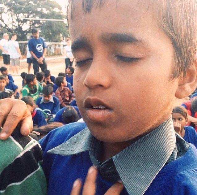 Shown here is one of my favorite photos from our last trip to India.. Language barriers cannot keep the Love of God from getting through to a young man's heart. We love seeing children accept Jesus as their Savior.