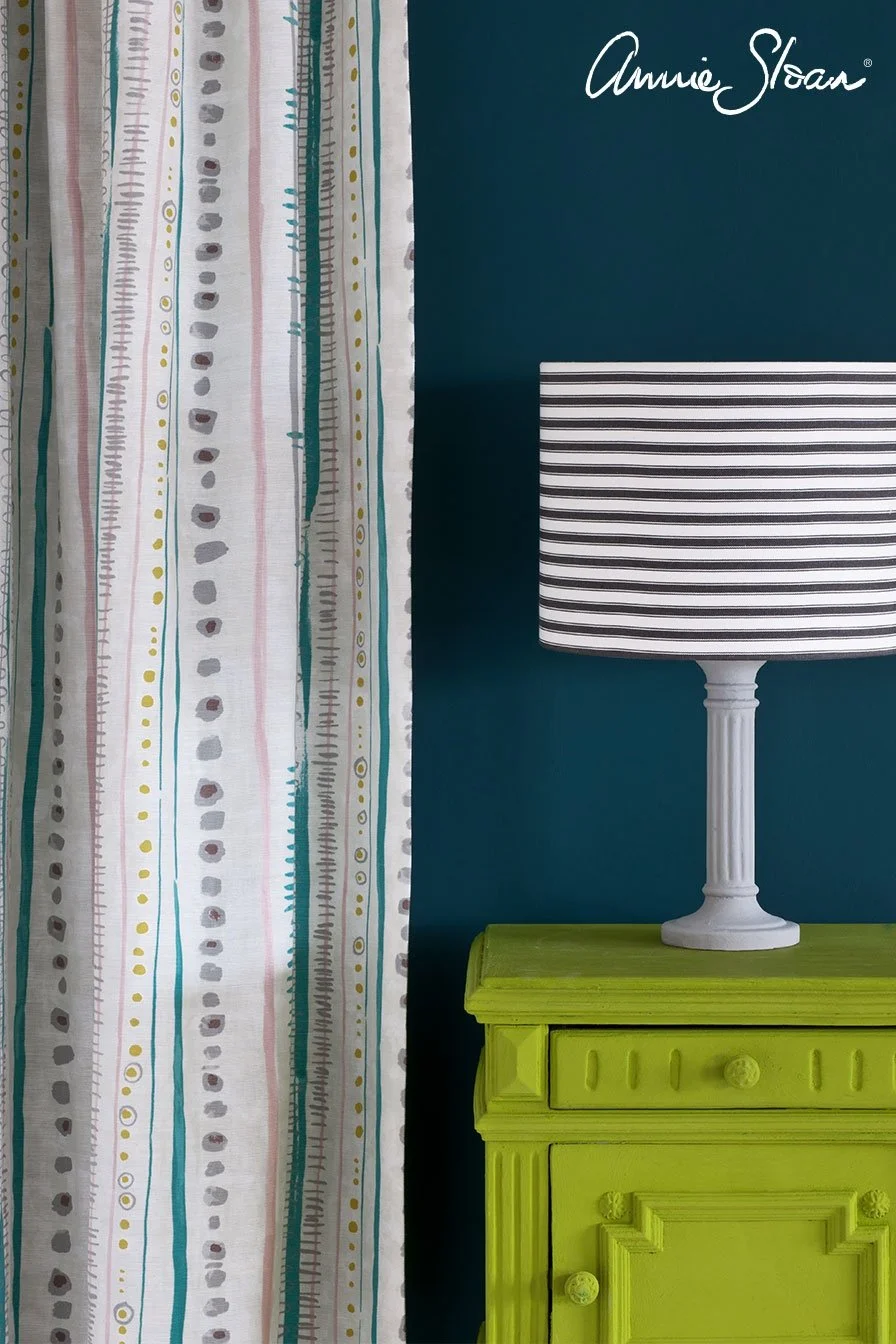 firle-side-table_-wall-paint-in-aubusson-blue_-piano-in-provence-curtain_-ticking-in-graphite-lampshade_-72dpi-image-3.jpg