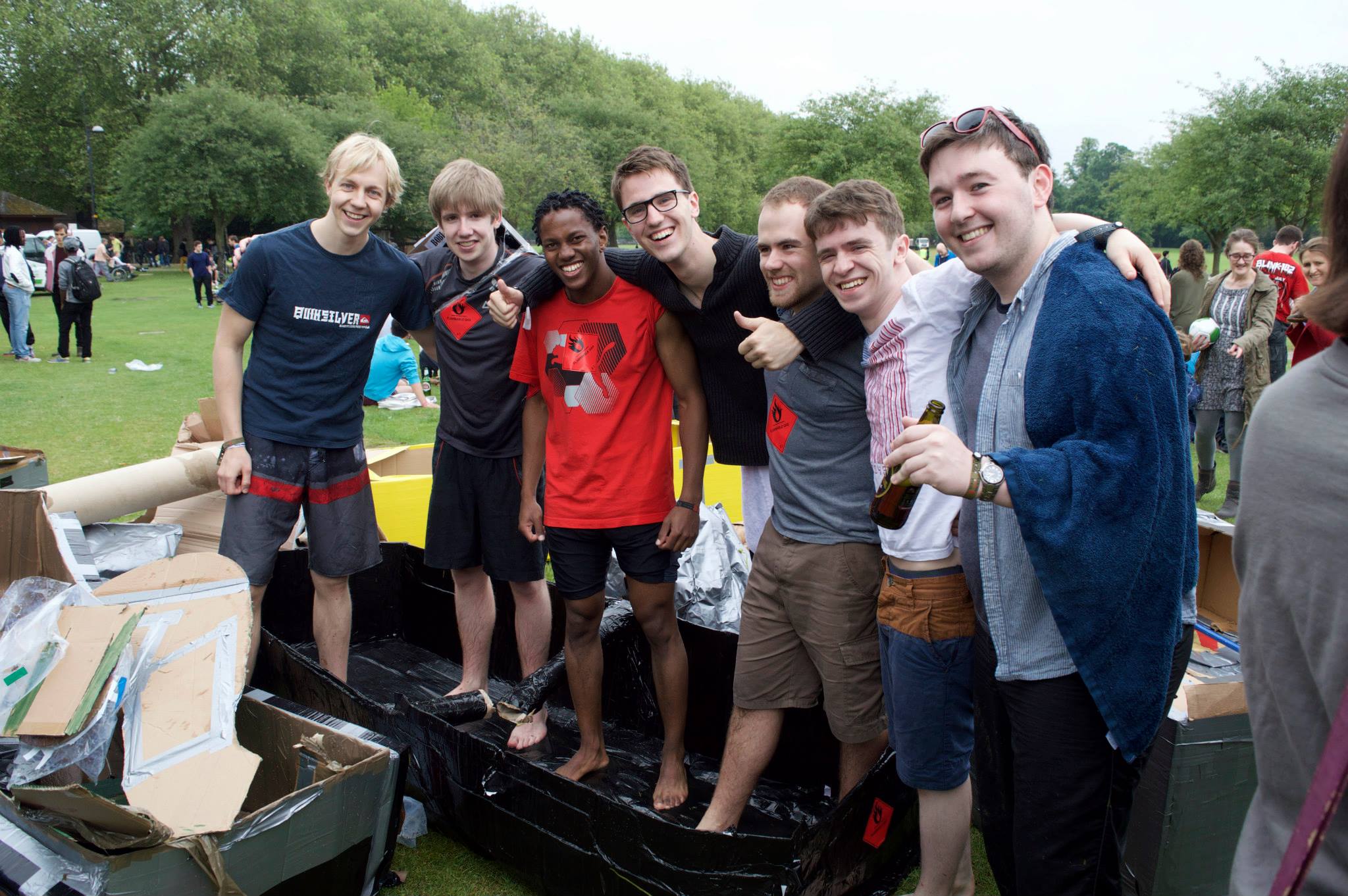 Us standing in the surviving half of the boat. I'm smiling but I'm truly dead inside. 