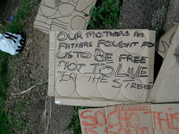 Discarded signs used in protest by residents illegally evicted from Valley View social housing complex, Hillary, Durban (2011).