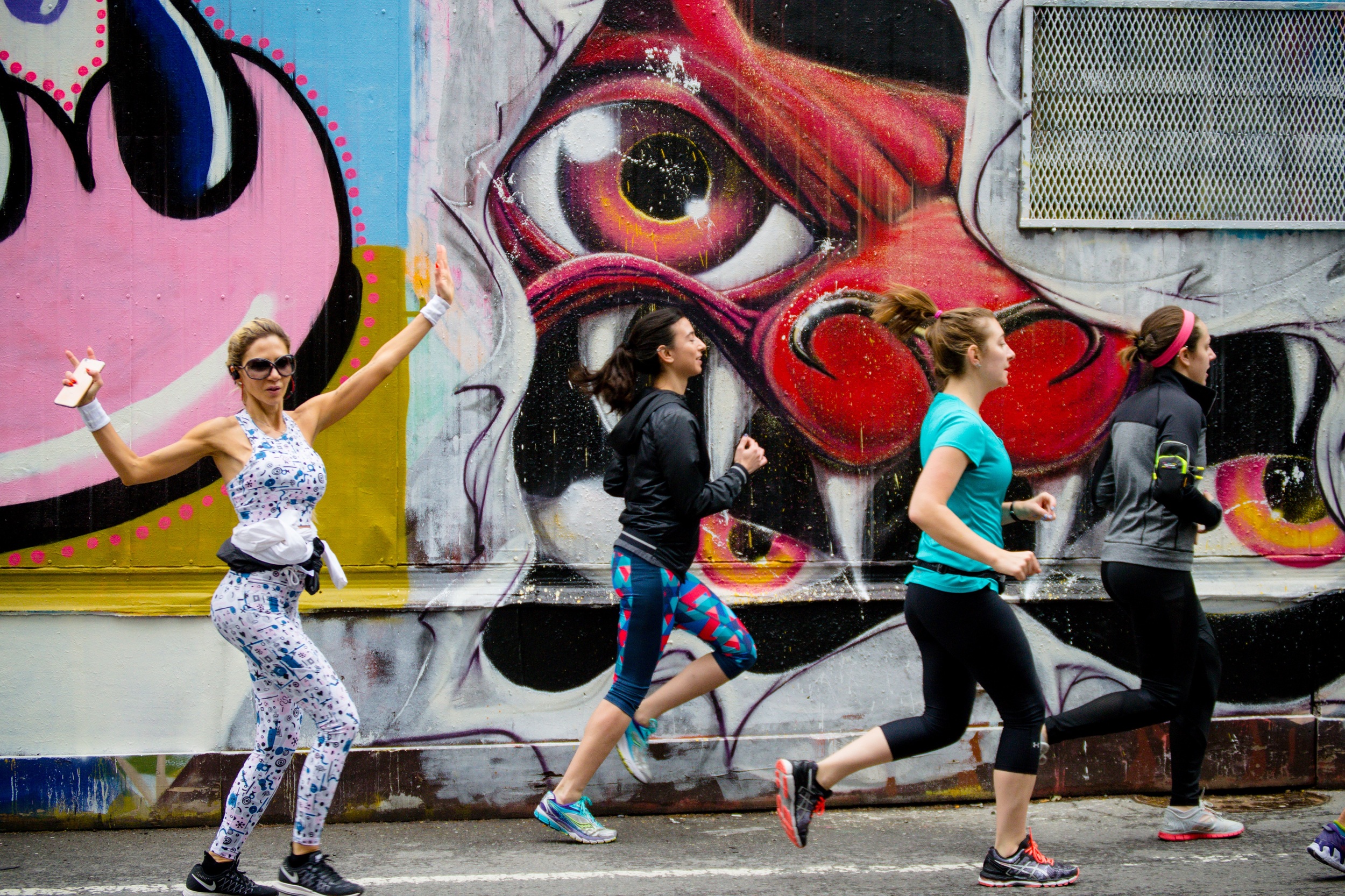 Photo by Filles + Garcons Photography . Murals by Claw Money and Himbad .