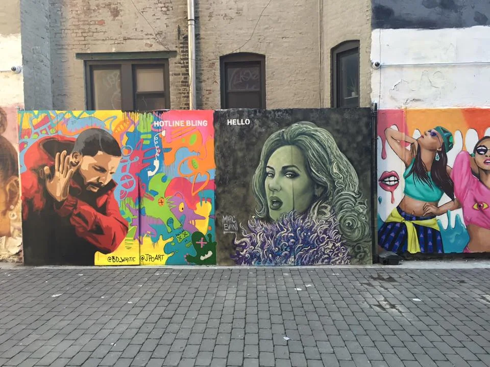 Photo by Filles Garcons . Mural at First Street Green Art Park .