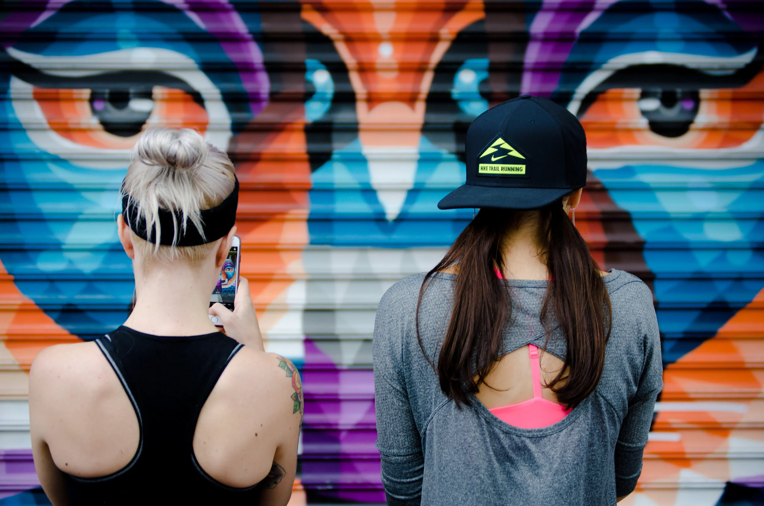 Photo by Filles Garcons of Runstreet art runners at I Am Eelco mural on the Lower East Side, NYC.