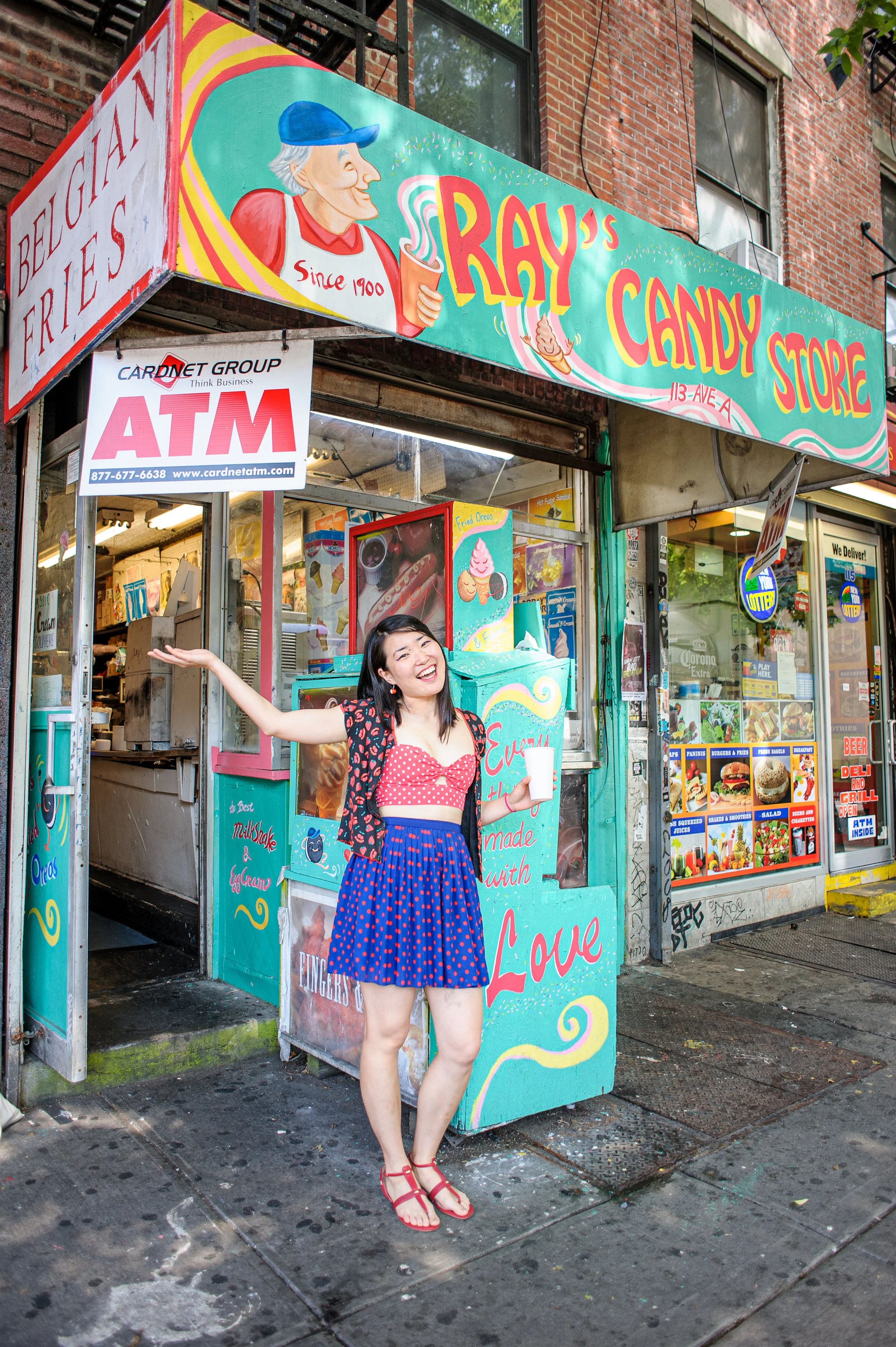 Peach with the art she painted at Ray’s Candy Store.