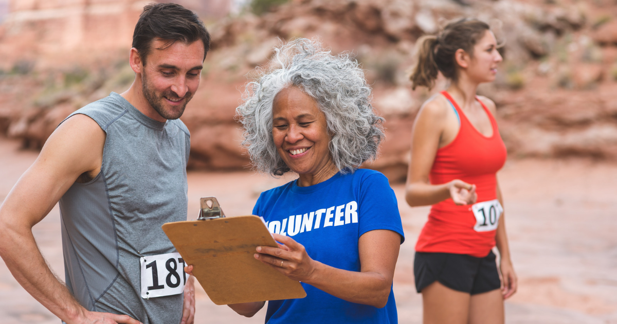 race volunteer and runners charity 5k