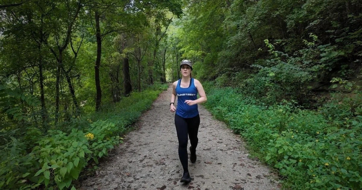 haunted runs woman running on Zombie Trail in St. Louis, MO