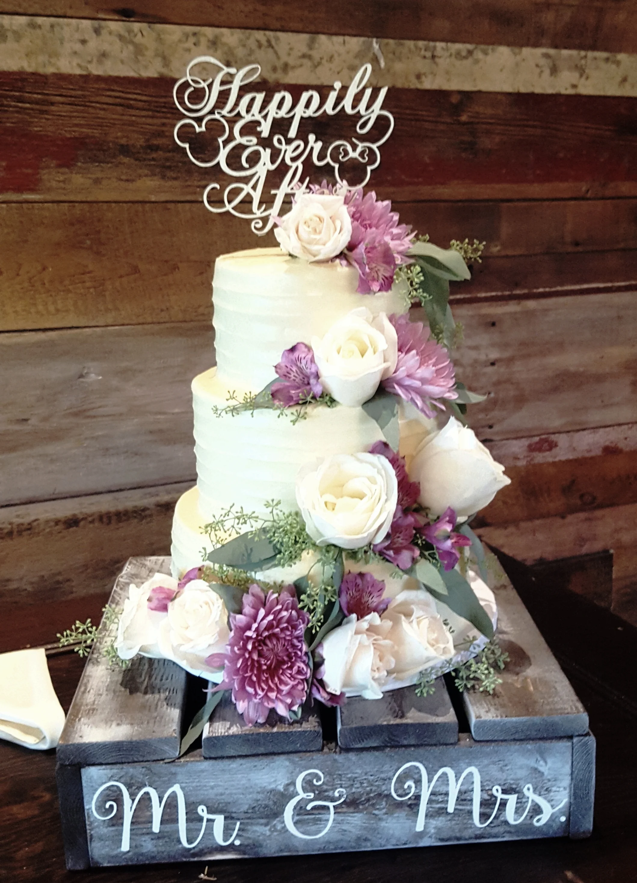 Our Events Team are experienced to safely get your cake where it needs to be at the time it needs to be there. The florals on this cake were placed by one of our Events Managers.