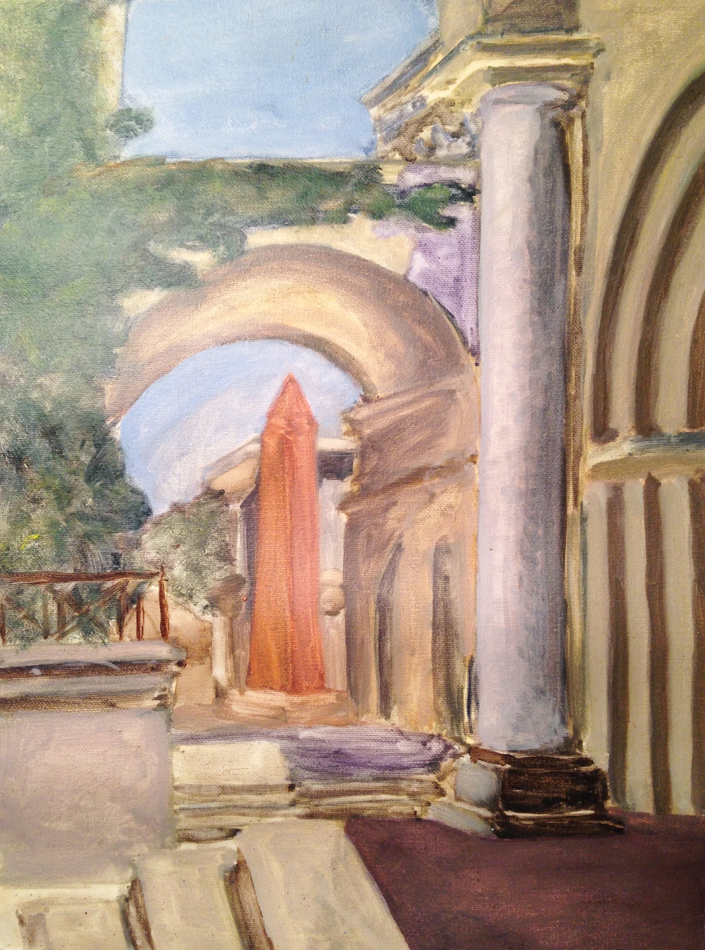 Obelisk on campus in courtyard near Maxwell