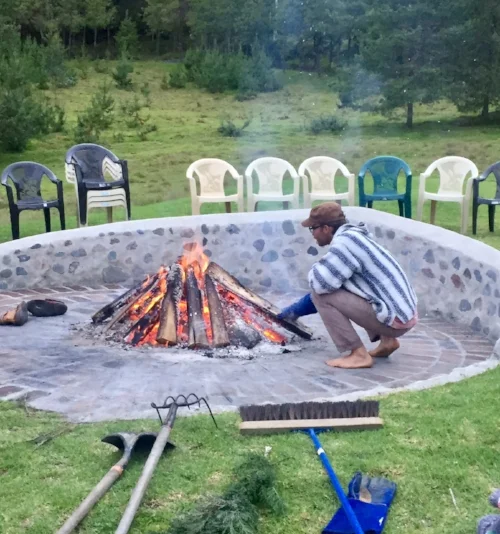 Keeping the sacred fire for the sweat lodge at Gaia Sagrada