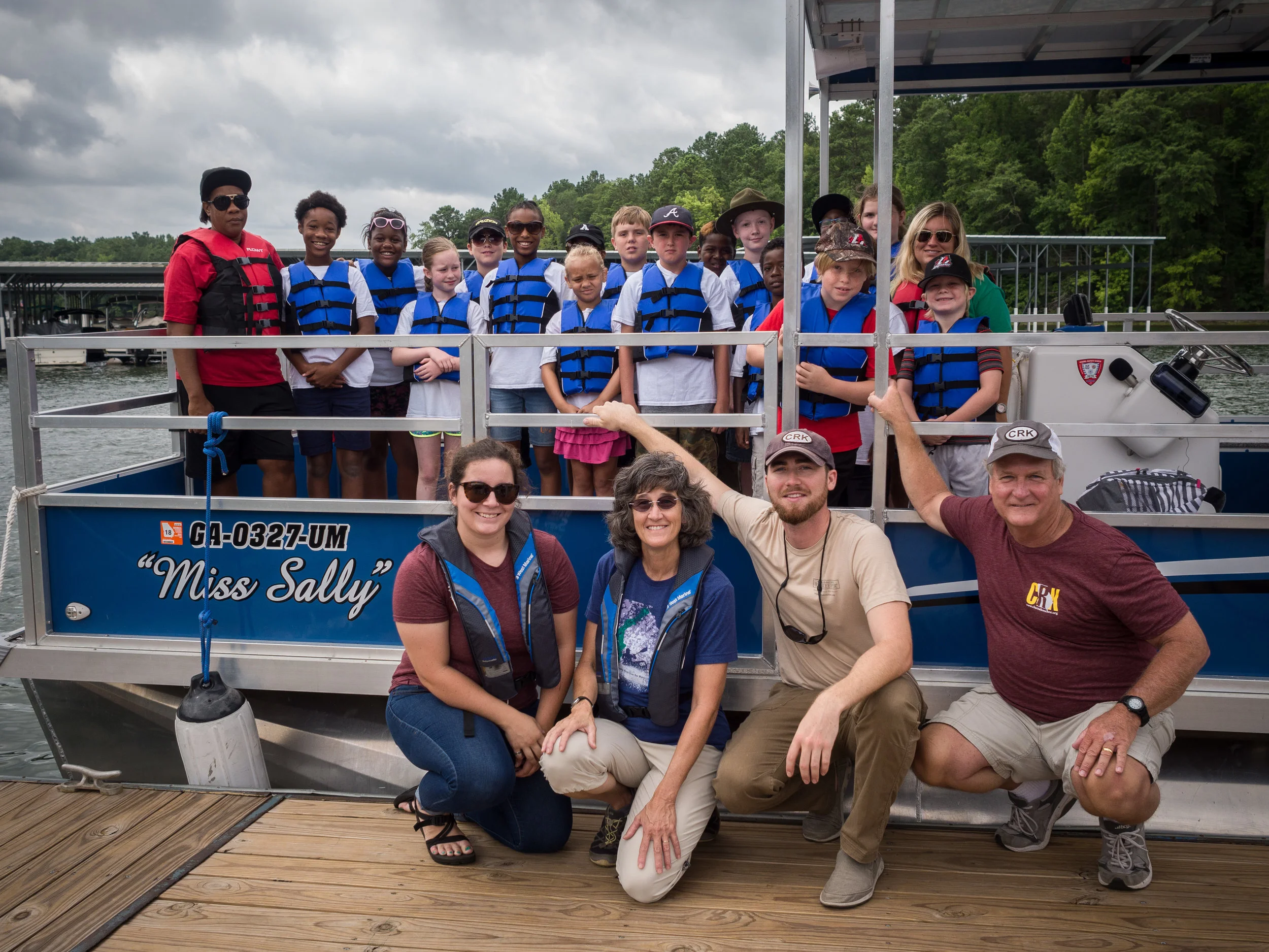 Headed out for a program on the Miss Sally. CRK staff pictured kneeling from left to right: Hannah Bradford, Laura Breyfogle, myself, and our boat captain Jim West. July 28, 2016.