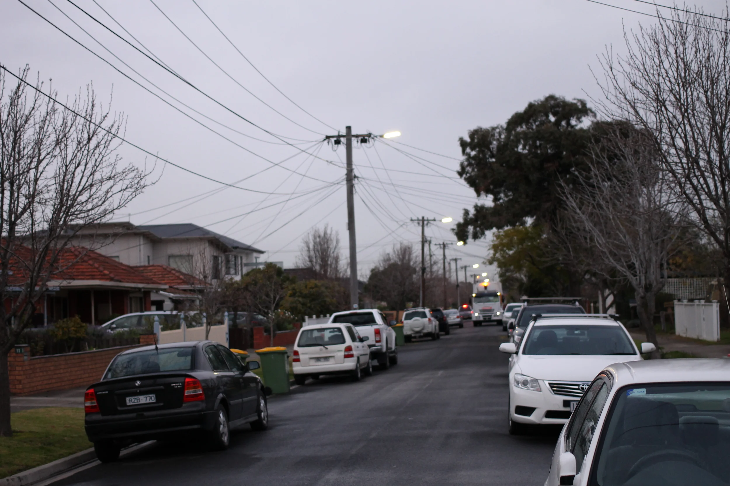 The Bin - arrival of the garbage truck.