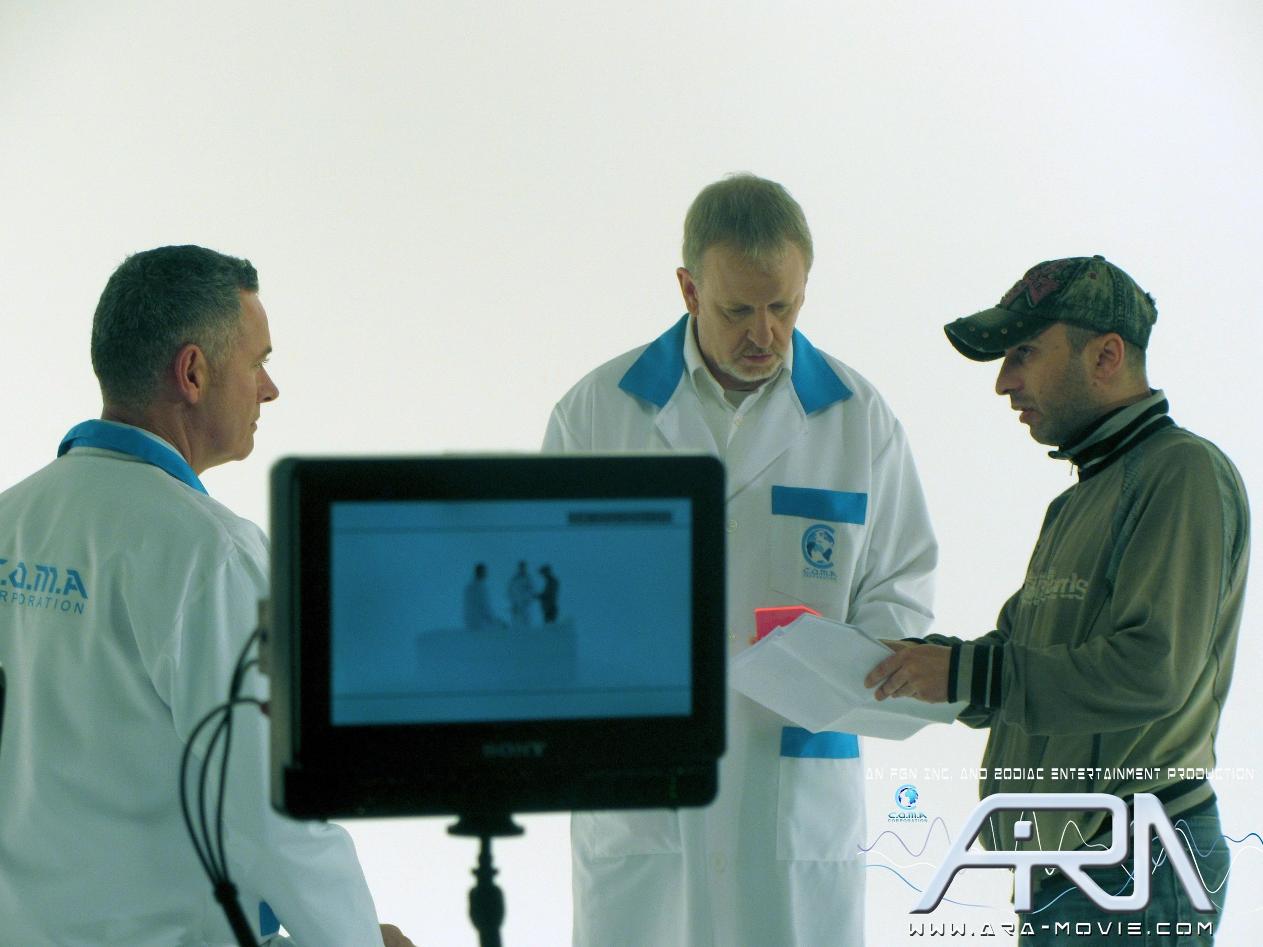 From Left to Right: Tony Scahill (Jason), Kevin Harty (Dr. Styles) &amp; Director Dimi Nakov discuss one of the scenes. Photo Credit: Rakesh Raj