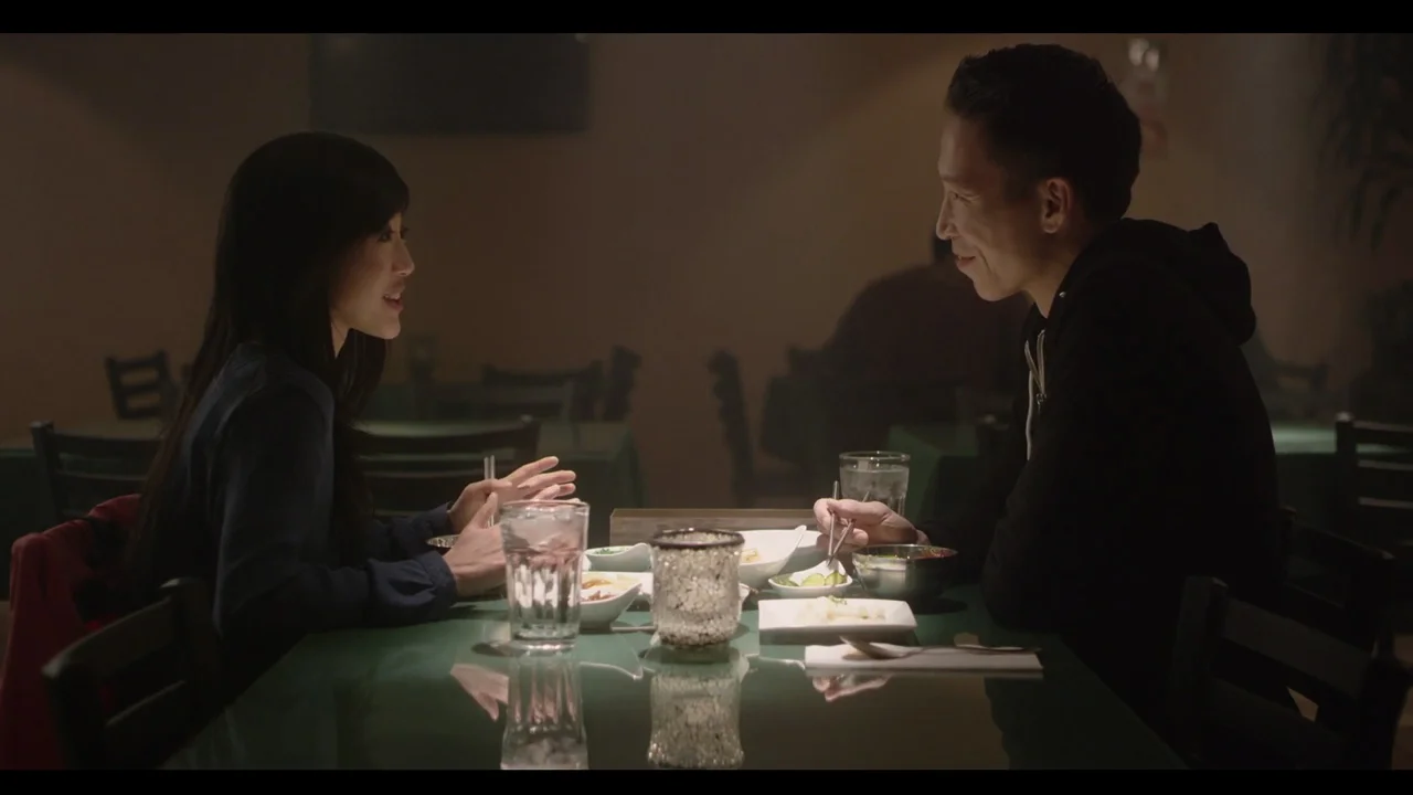 L to R: Julie Zhan as Jasmine and Chris Dinh as Cameron in Comfort. Dir. William Lu. Image courtesy of Late to the Party Productions.