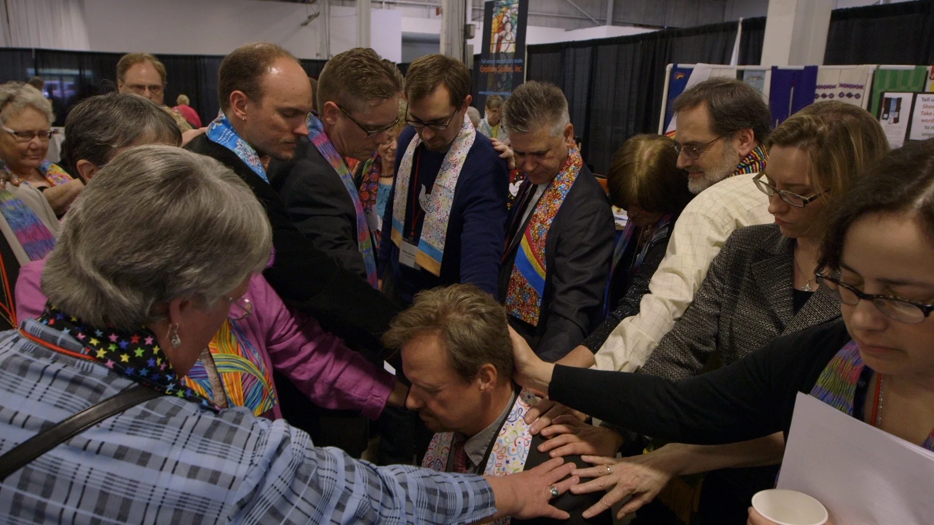 Former colleagues lay hands on Rev. Frank Schaefer at the Eastern Pennsylvania Annual Conference in 2014.