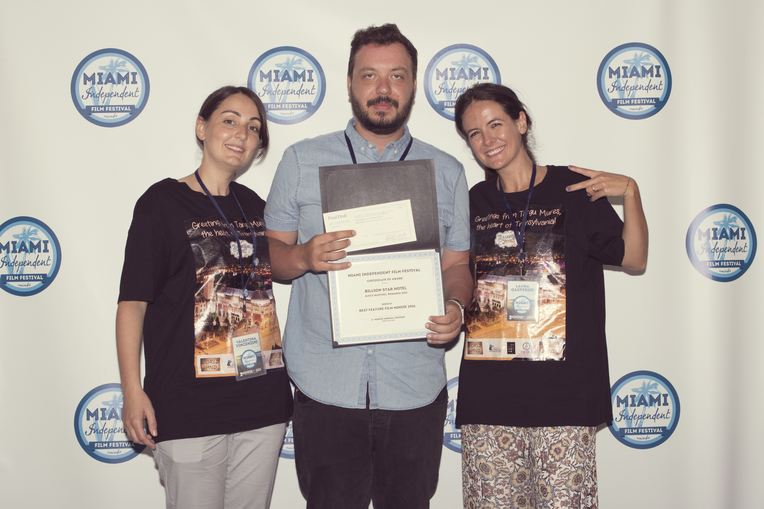 Festival Directors Valentina Vincenzini and Laura Gsperini with Best Feature Film's Director Alecs Nastoiu.