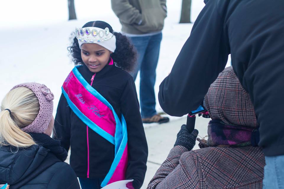 Producer Liv Larsen interviews Little Miss Flint, Mari Copeny, about what it’s like living in Flint during the time of this crisis as crew members Izak Gacy and Lauren Selewski film.
