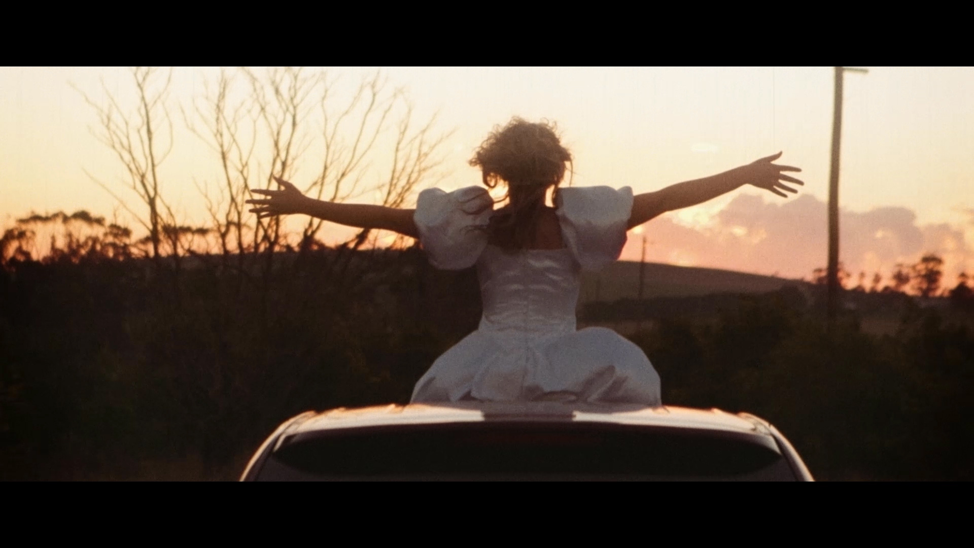 The Happiest Day of my Life - Raptuously Becky (Jeni Bezuidenhout) embraces the fading light of the happiest day of her life.