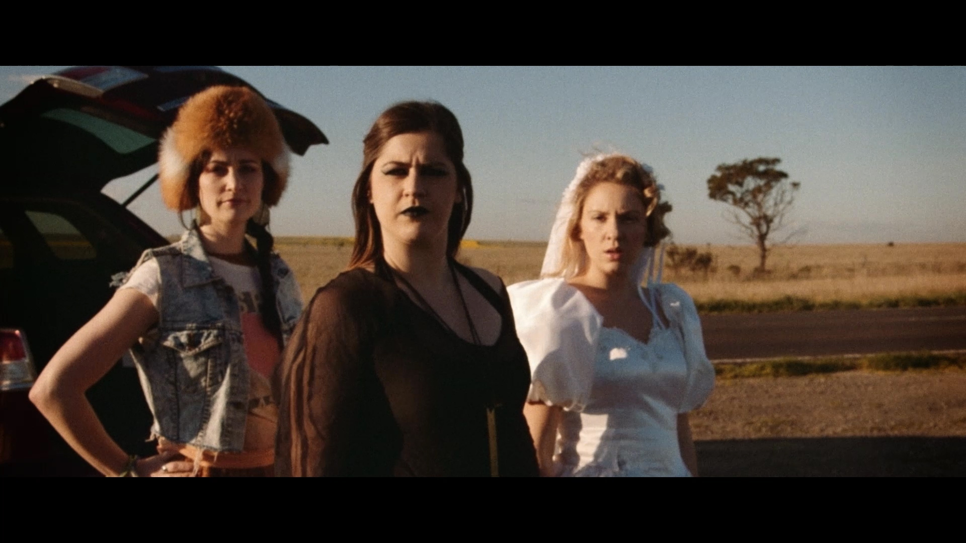 The Happiest Day of my Life - The murderous three watch Thomas' ill-fated escape (L-R Aimee Sanderson, Isabelle Bertoli & Jeni Bezuidenhout).