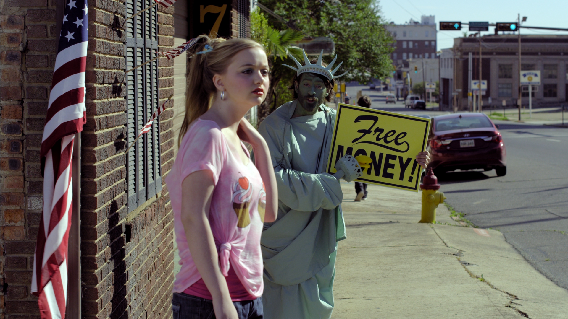 Allie meets an interesting Statue of Liberty (Joe Otcherbeck) character on the streets.