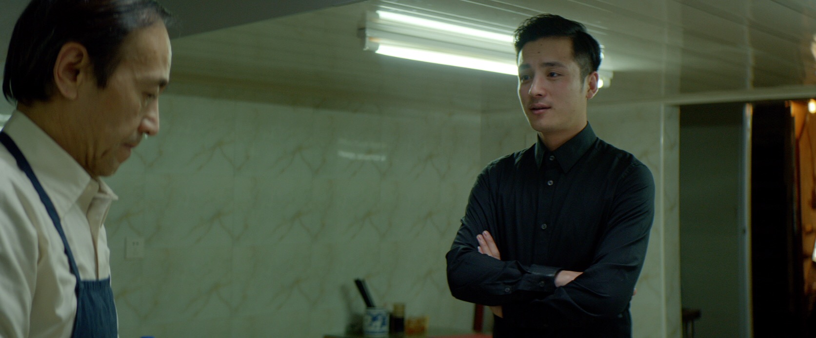 Liwei and his father (Cao Shi Ping) have different world views.