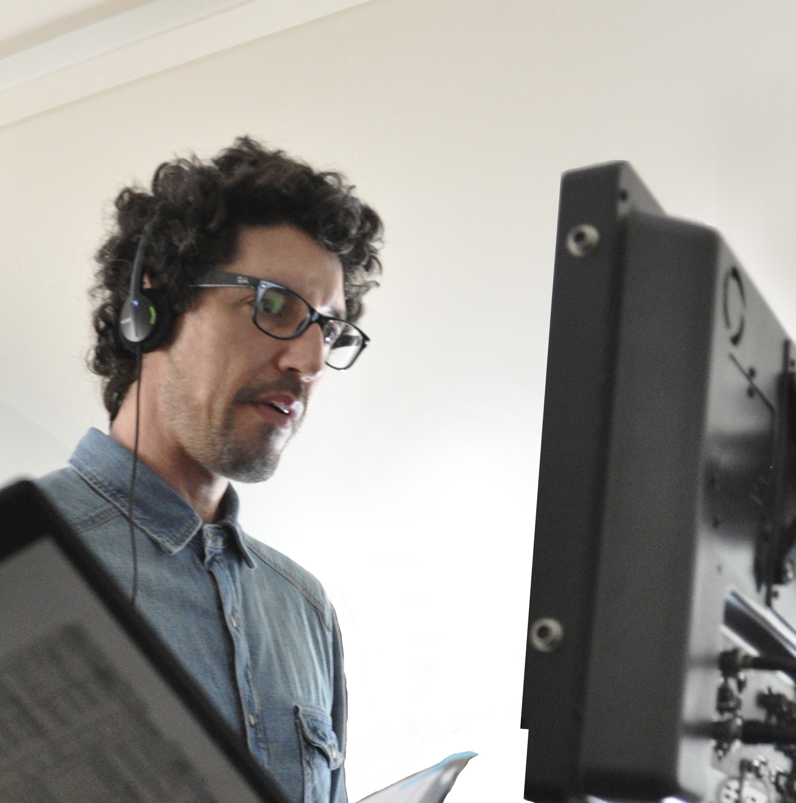 Quincy Rose – Behind the Scenes shot of Writer/Director Quincy Rose at the monitor.