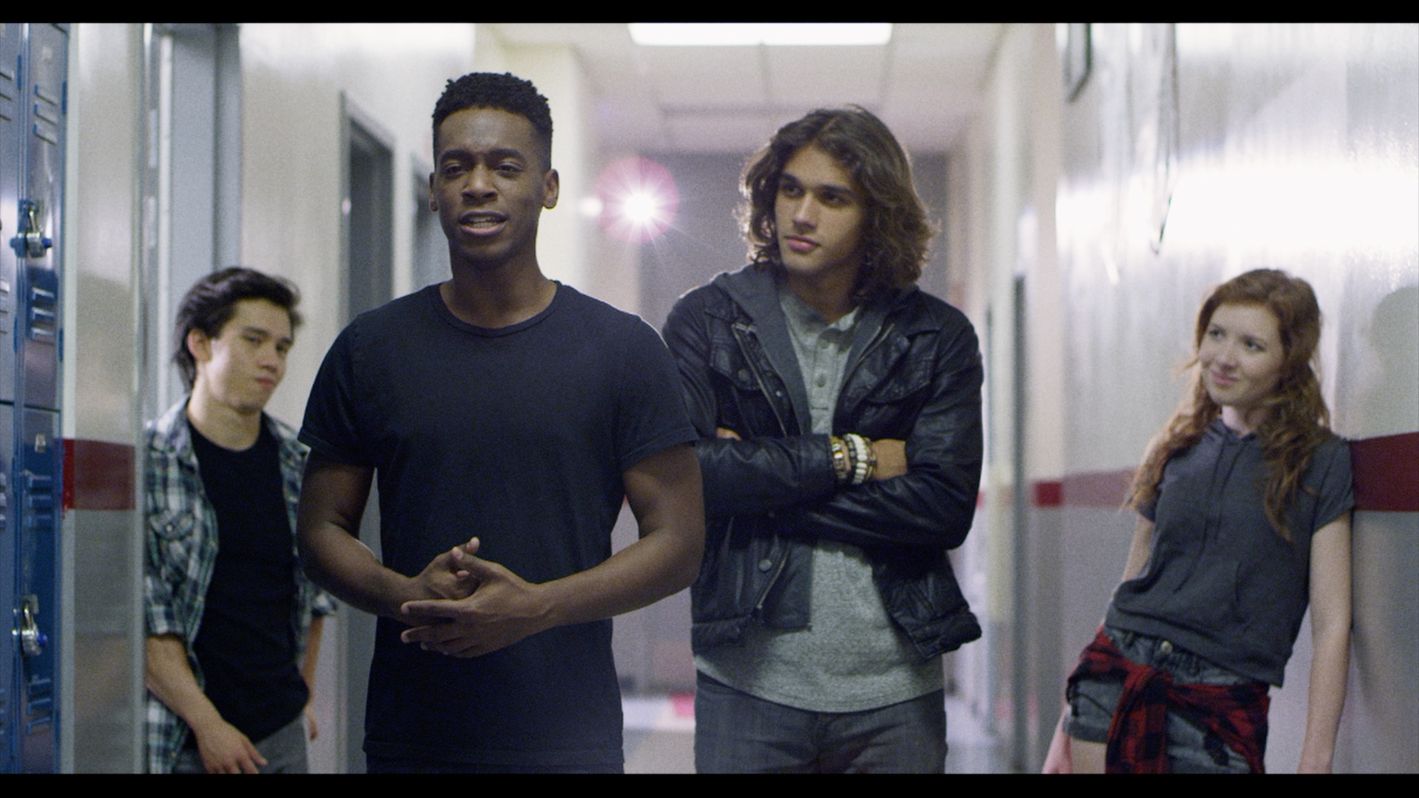 The Breakout: A Rock Opera's heroes in a moment of mushy bonding.