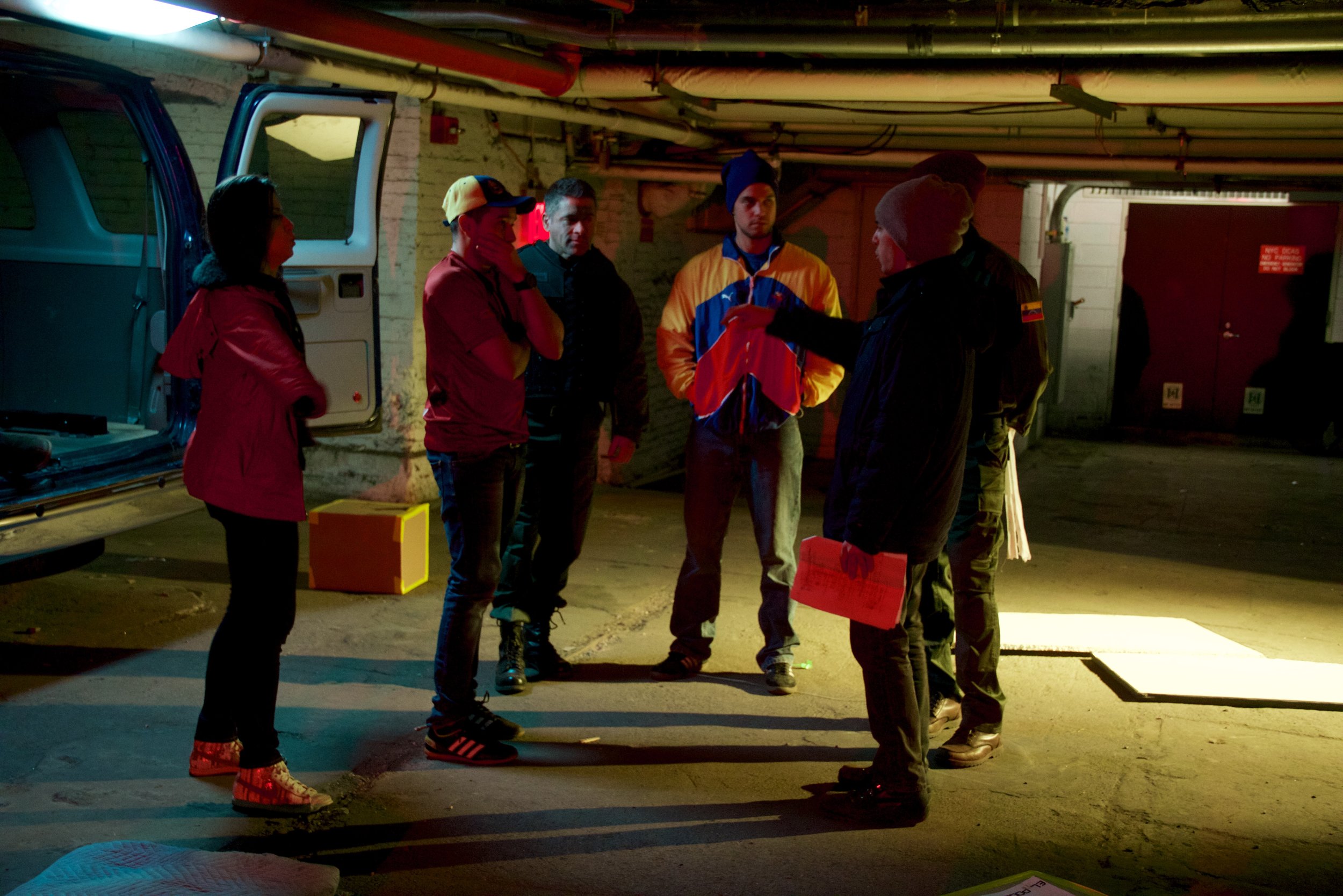 Williams Naranjo, Writer/Director of A New Civilization, instructs his core cast members in a final set rehearsal before cameras begin to roll. 
