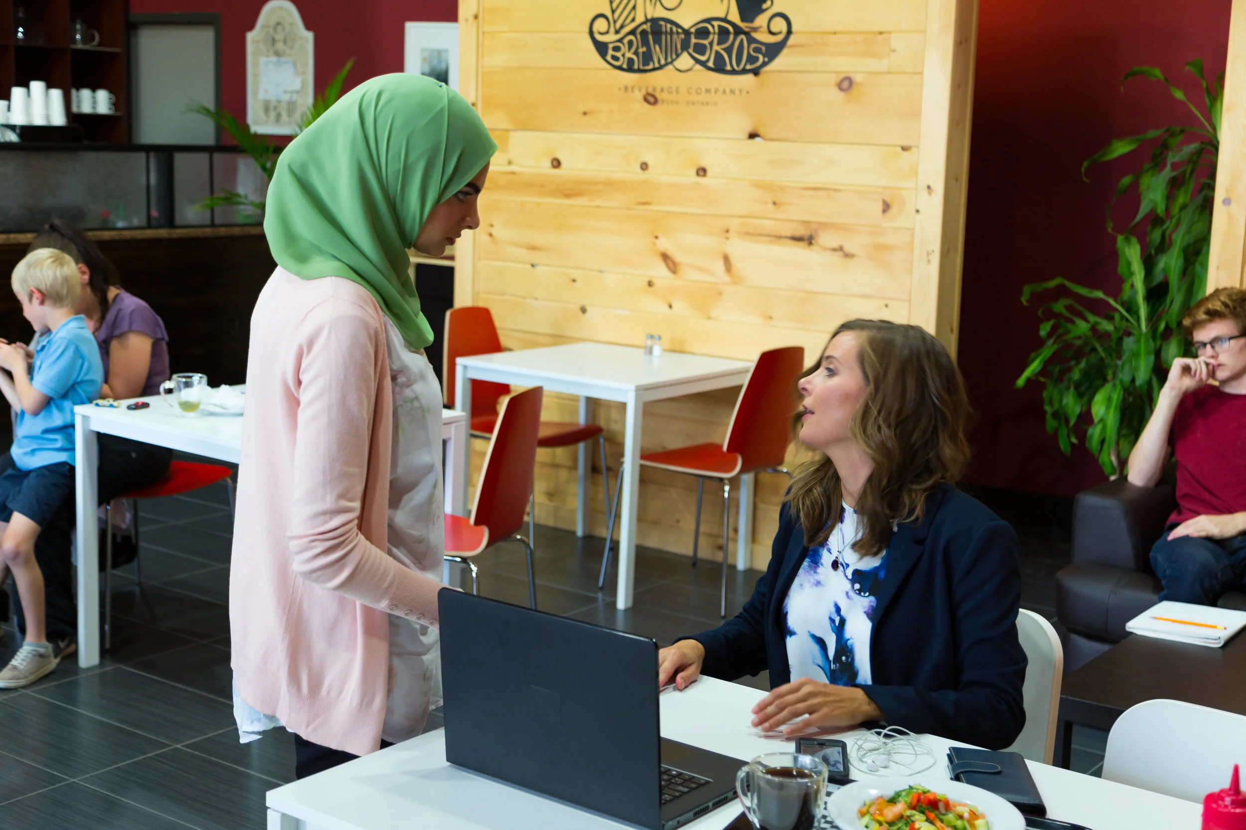 The Card - Director Asil Moussa and talking with Lead Performer Bridget Opfer on set.
