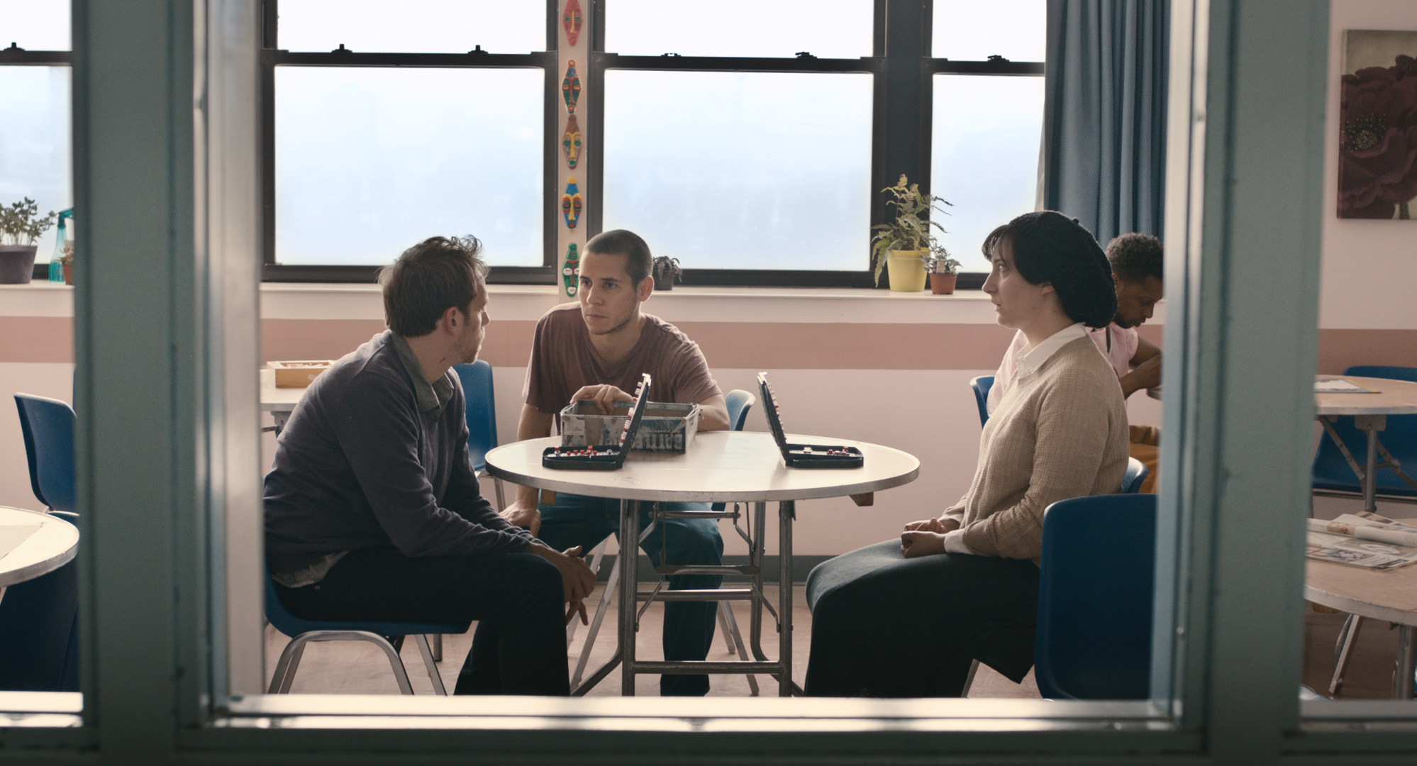 Adherence - Daniel interrupts a game of Battleship between Charlie and Maddy in the ward’s dayroom.