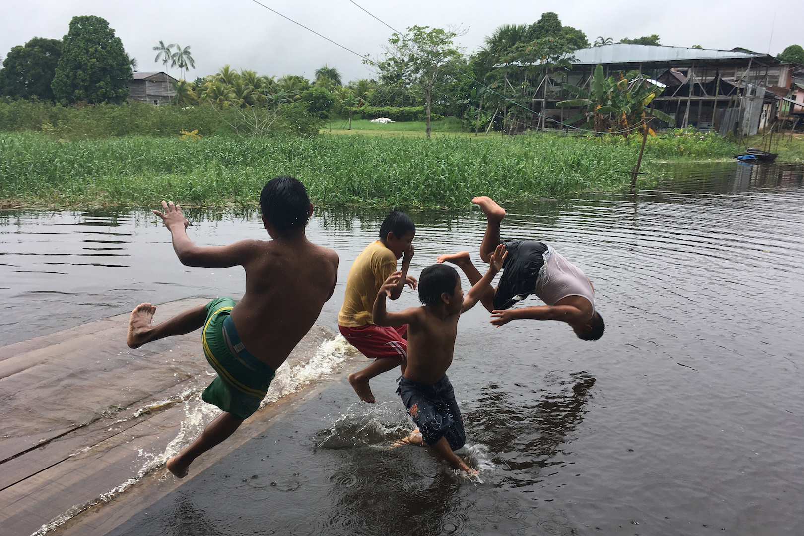 Kukama kids enjoy the river on a hot day