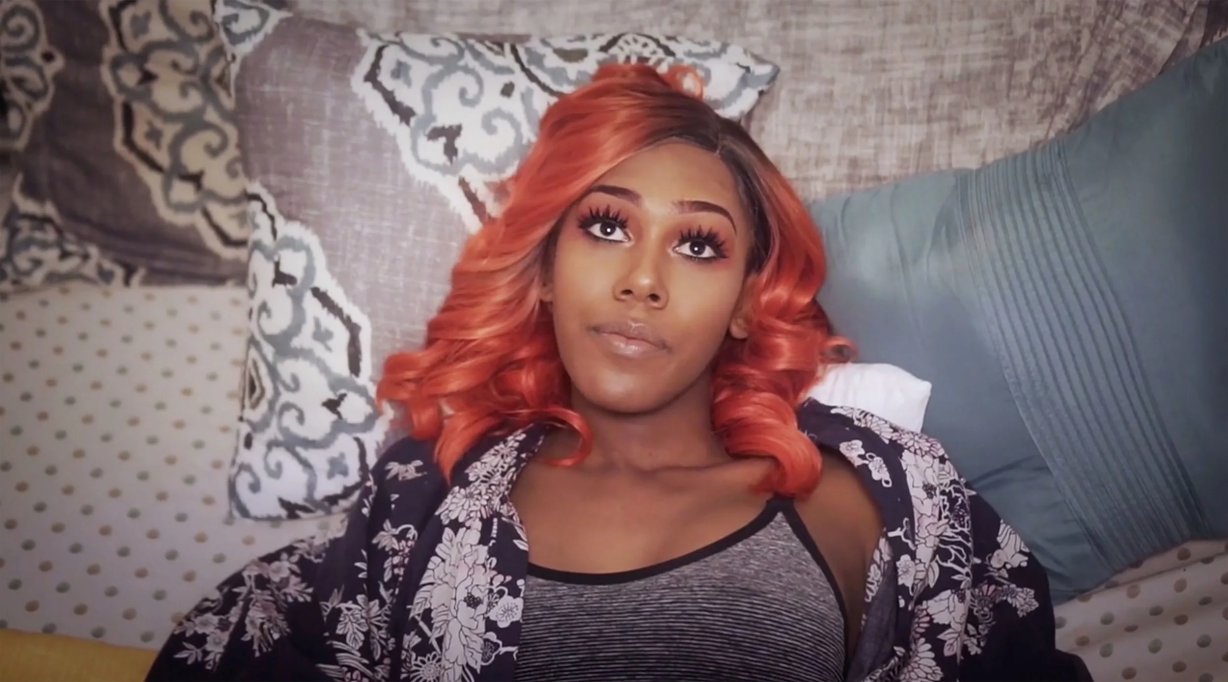 Chanel, on her bed, as she takes a moment to breathe before getting ready for the club.
