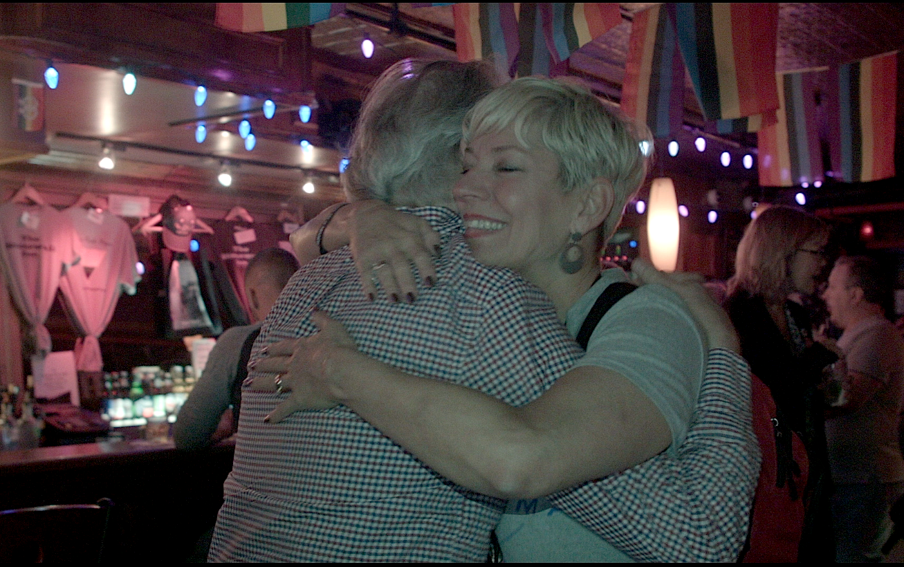 Sara Cunningham offers free hugs at Stonewall Inn, the last stop on her first "Free Mom Hugs Tour."