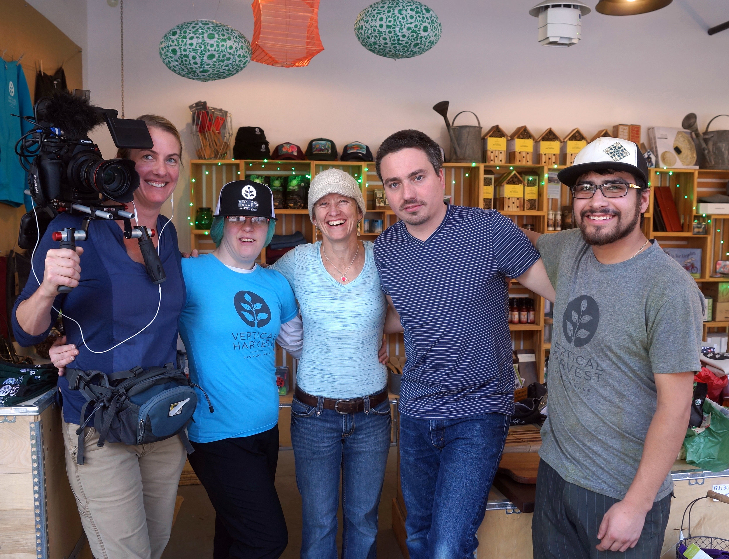 Behind the scenes of Hearts of Glass (the film director, co-DPs and Vertical Harvest employees take a break for a photo).