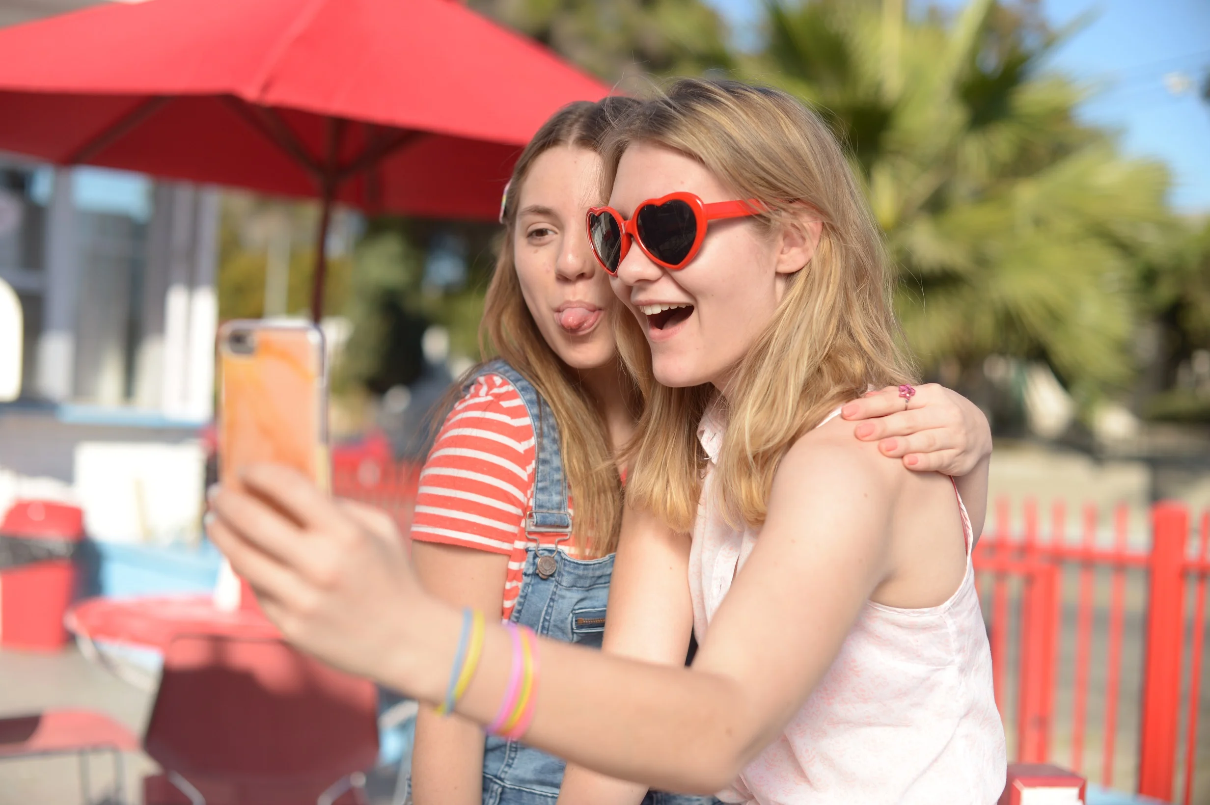 Georgie T. Willow as "Stella" and Ryan Simpkins as "Jess" take a selfie