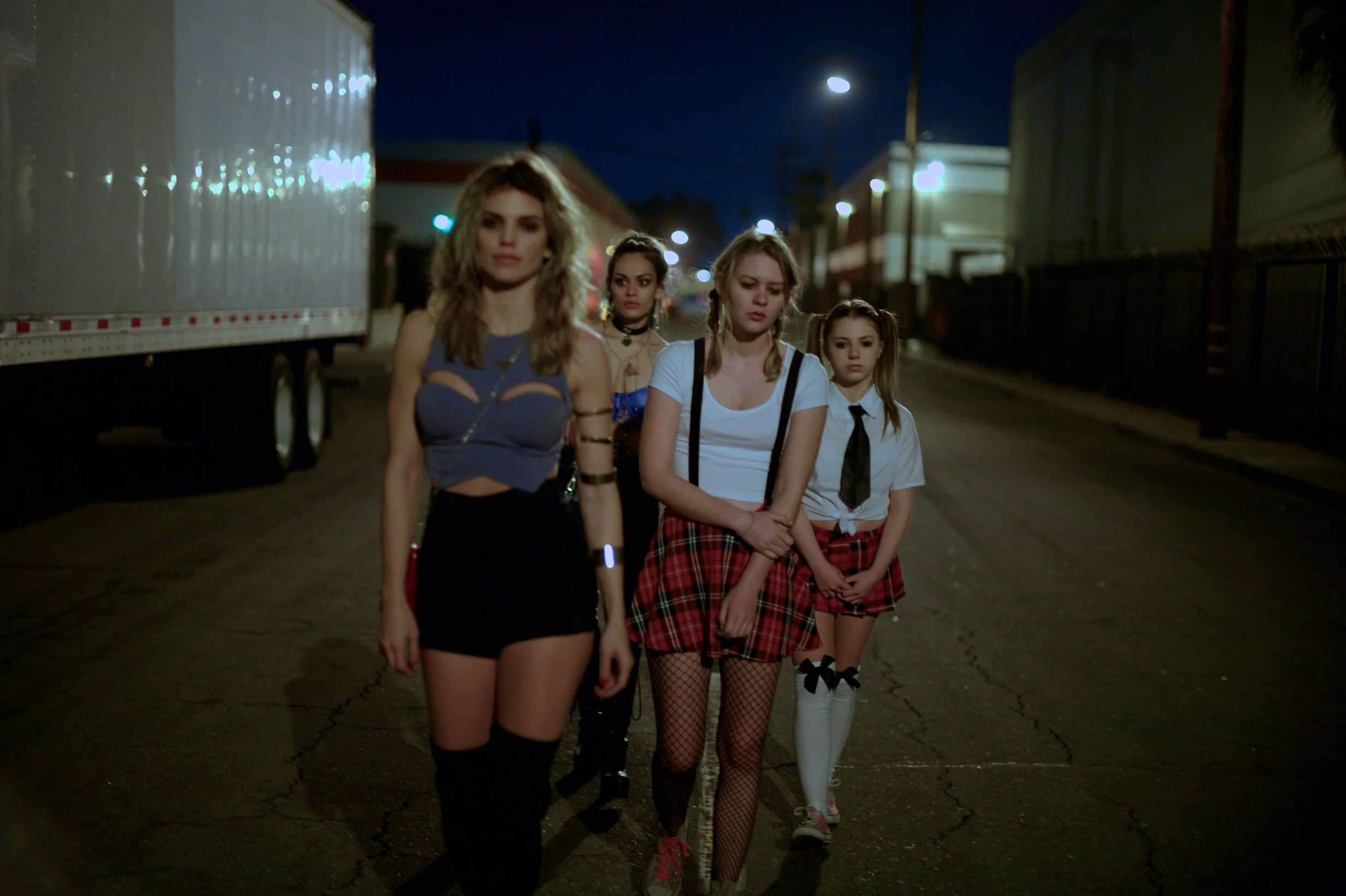 AnnaLynne McCord as "Divinity," Natalia Warner as "Bambi," Ryan Simpkins as "Jess" and Georgia T. Willow as "Stella" work a truck stop