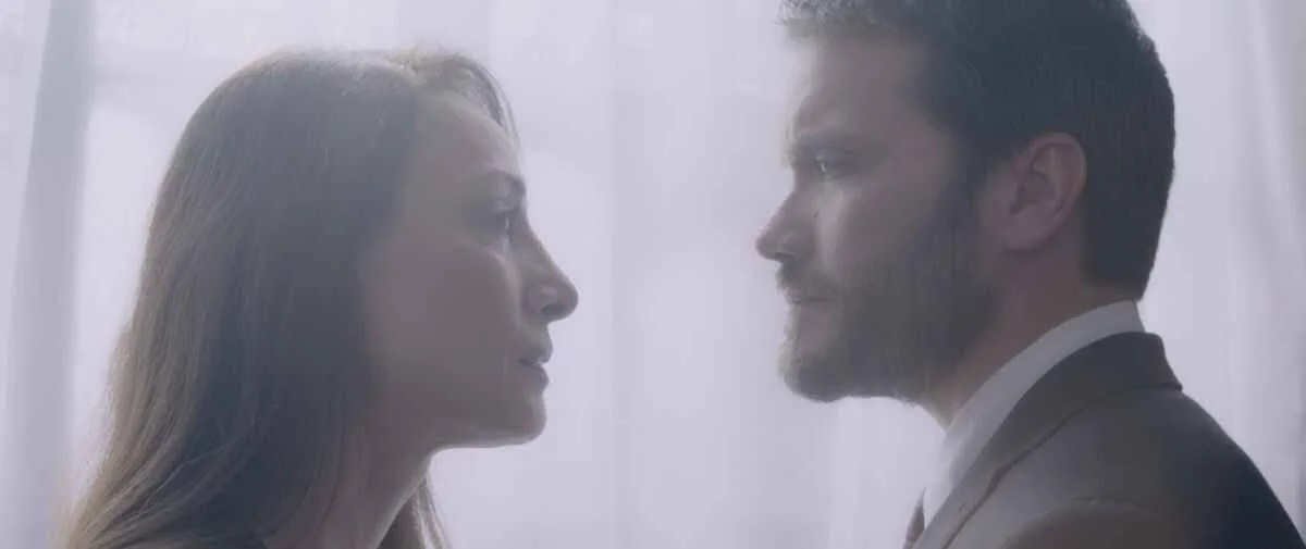 Danielle Rayne and Dom Zamprogna as Judith and Robert Westfield