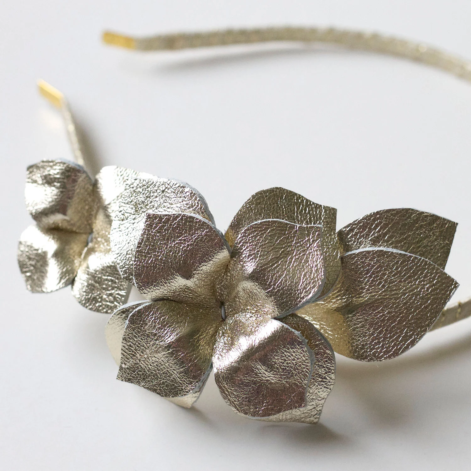 gold leather side flower headpiece_image2_1500x1500.jpg