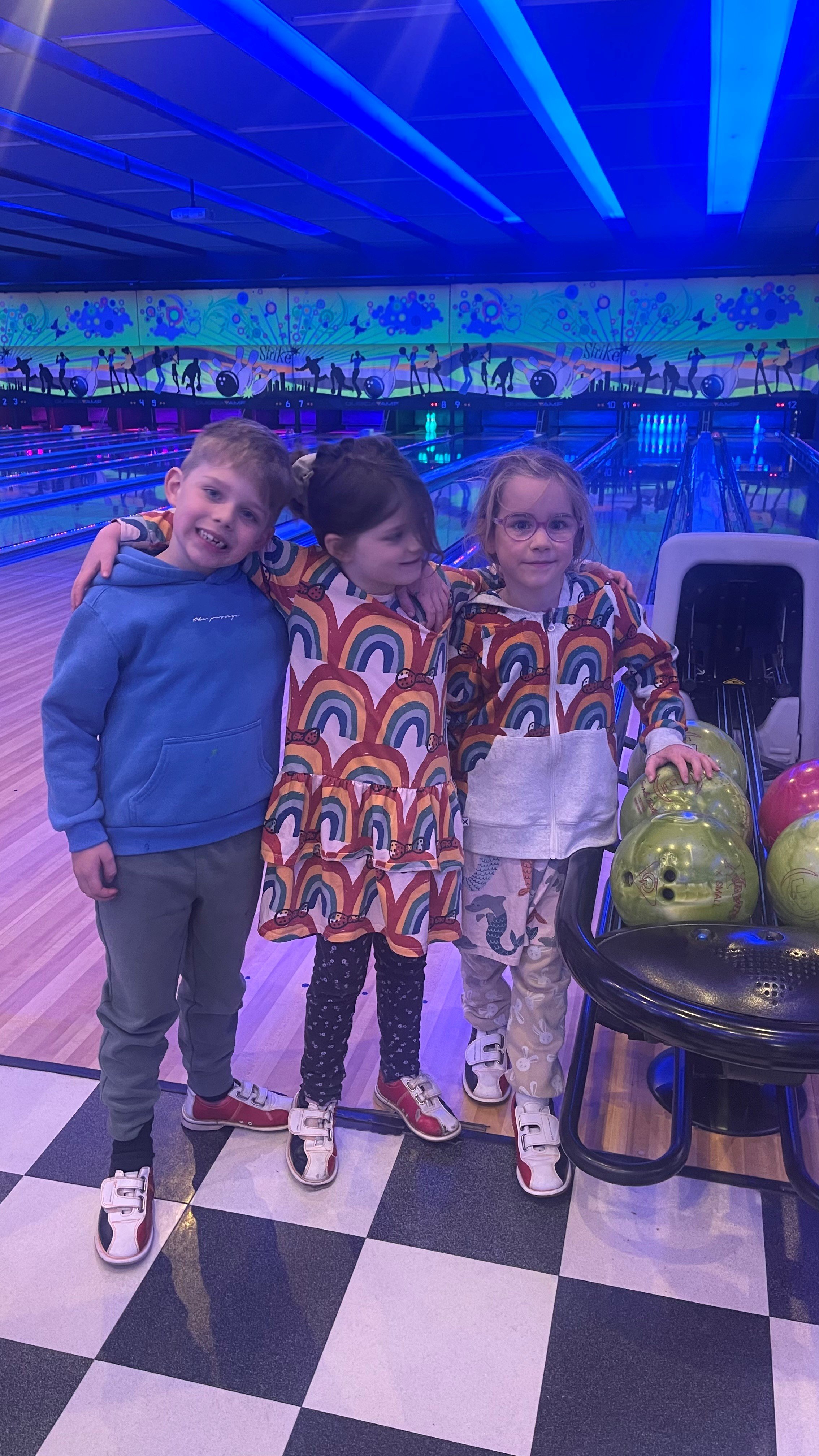 three kids bowling.jpg