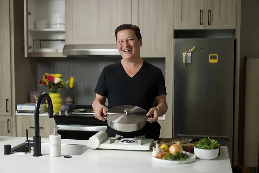 Kenji López-Alt poses with his new Our Place braiser