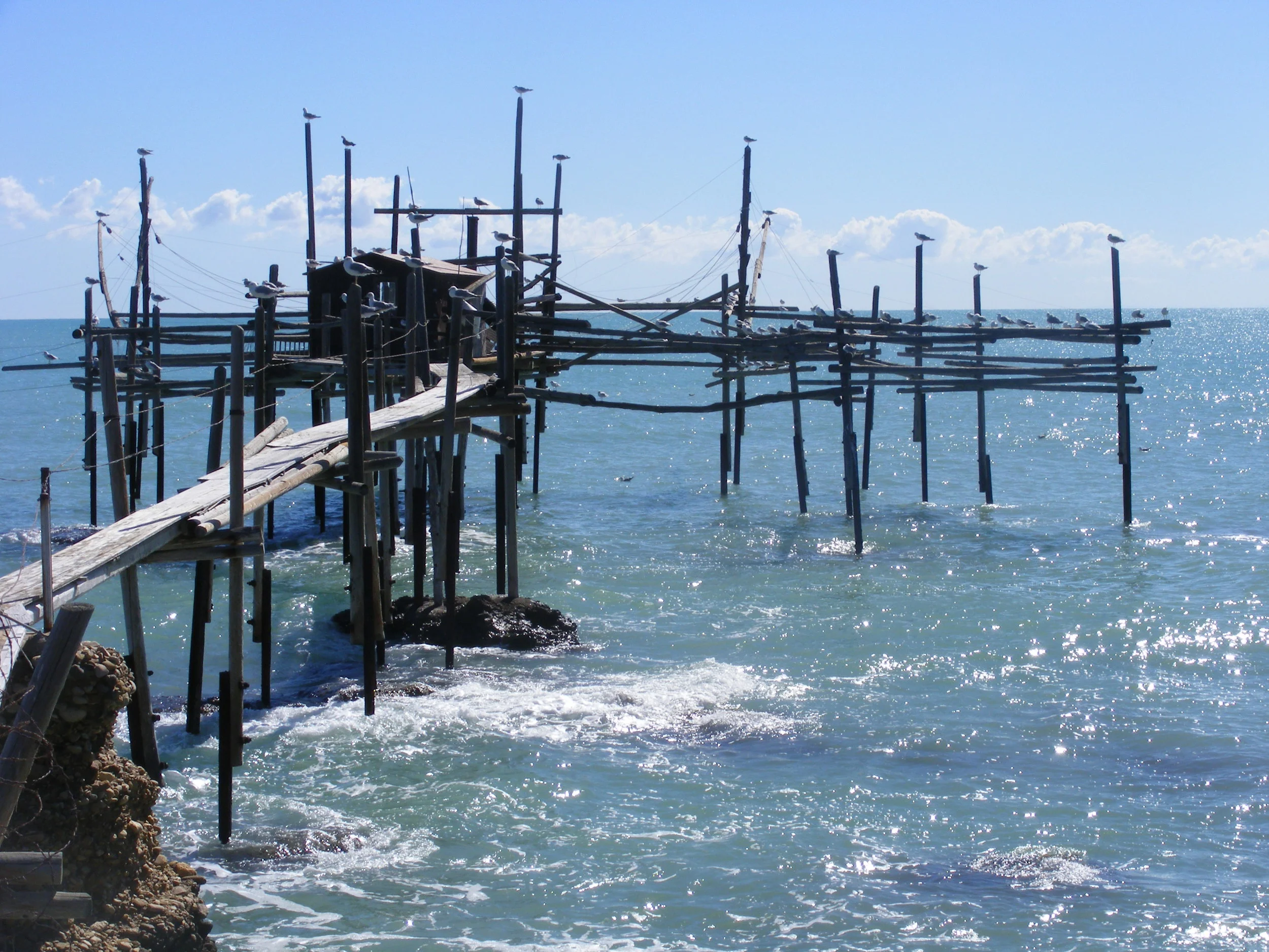   DAY 3  - THE ADRIATIC COAST  A trip to the coast to see fishing platforms only found in Abruzzo.   Experience the Canadian WWII cemetery near Ortona.  Seafood lunch on a unique fishing platform over the sea.  Visit San Giovanni in Venere, a medieva