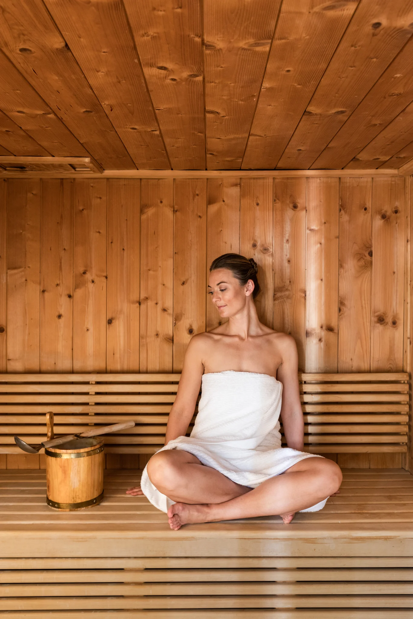 Girl relaxing in the sauna at Delaire Graff Spa