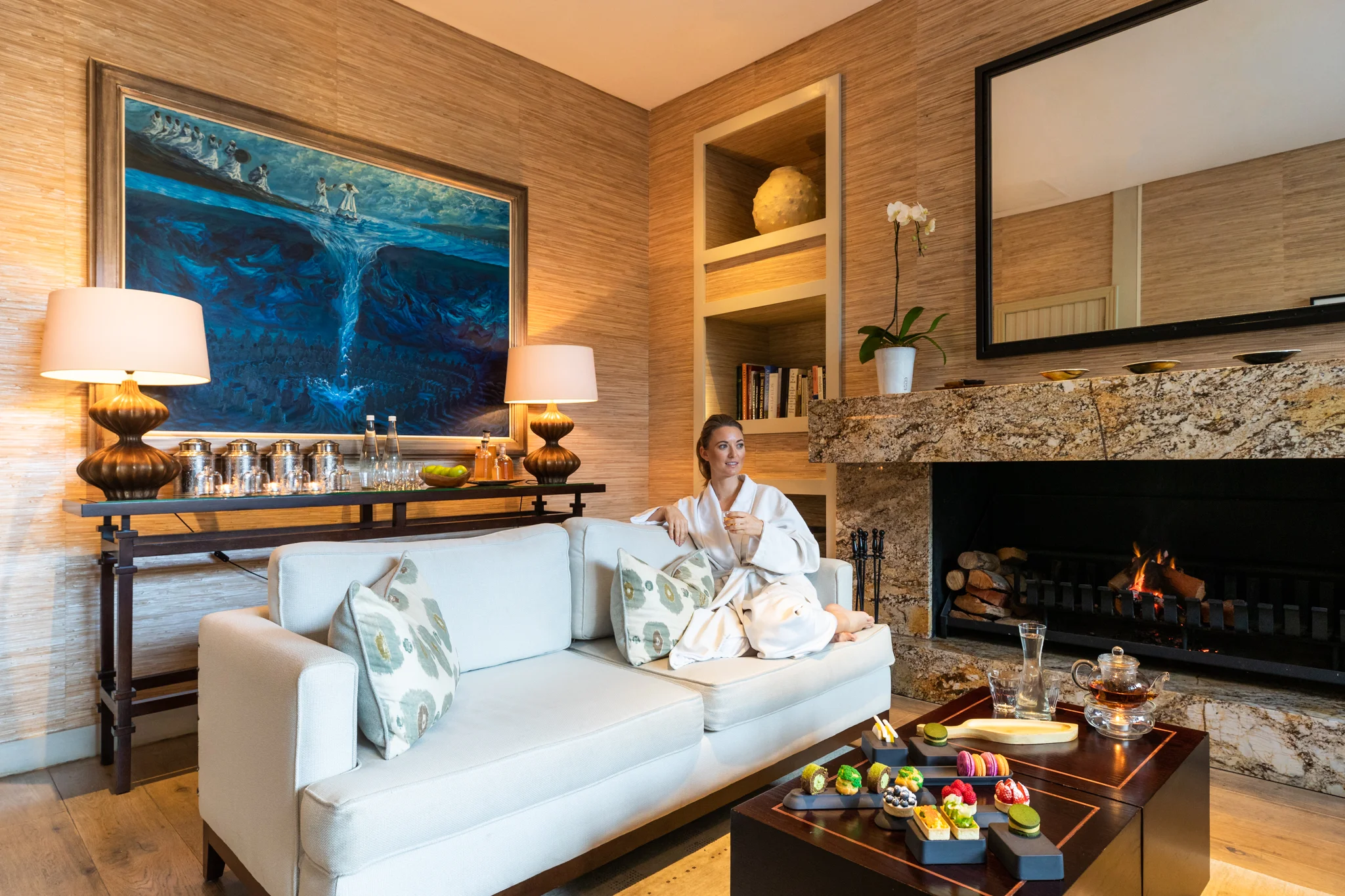 Girl enjoying an exclusive Afro-Asian high tea in the relaxation room at Delaire Graff Spa